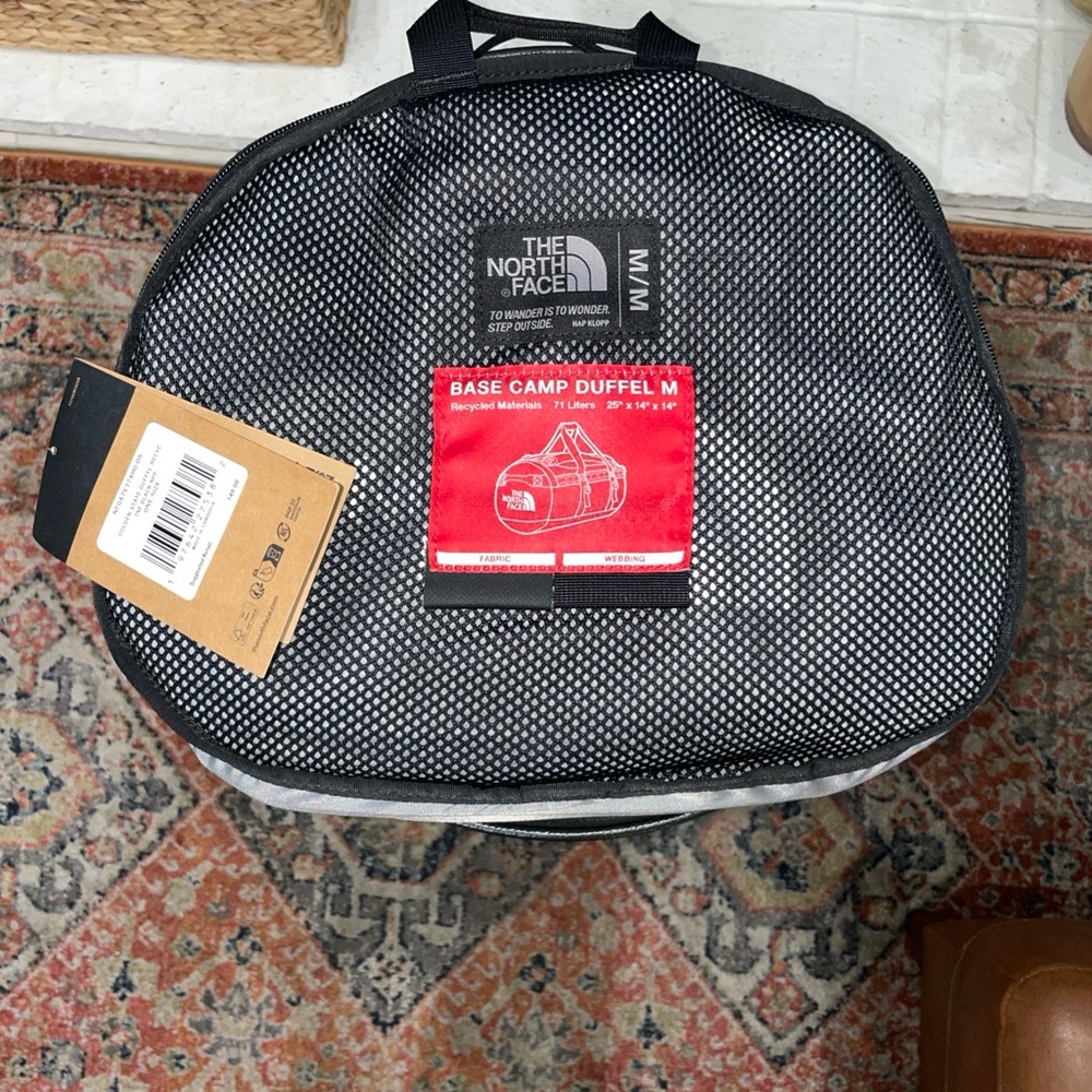 The North Face Black and White Duffel Bag Medium 71 Liters